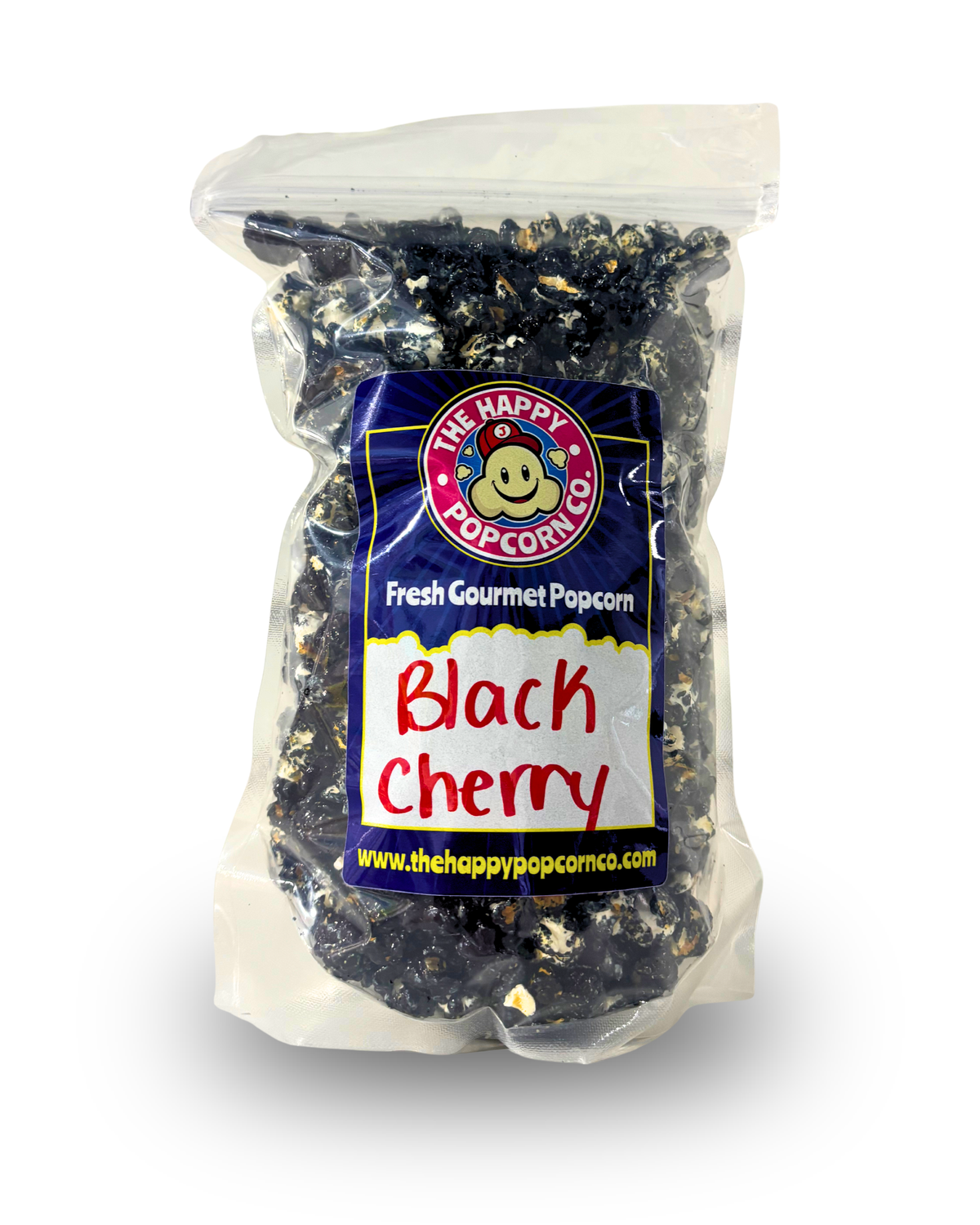 A clear plastic bag of The Happy Popcorn Co. Black Cherry gourmet popcorn, showing dark, glossy popcorn kernels inside with a blue and white label on a white background.