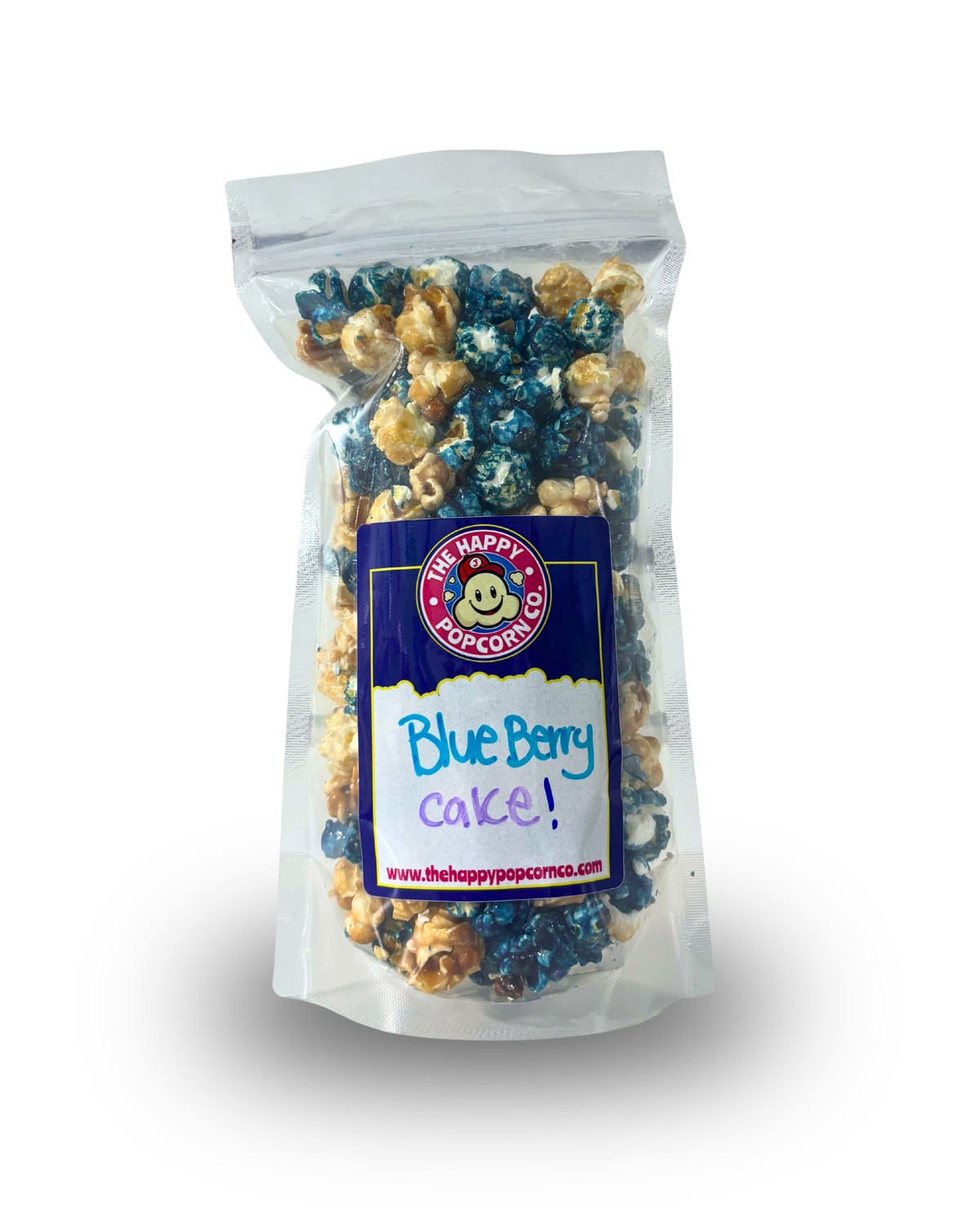 A clear stand-up pouch of The Happy Popcorn Co. Blue Berry Cake popcorn, showing blue and tan popcorn kernels inside with a blue and white label on a white background.