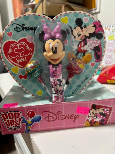 Disney Minnie Mouse themed lollipop set in a heart-shaped box with colorful packaging.